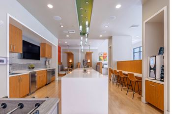 Mingle lounge with gaming area, hdtv, and ample comfortable seating